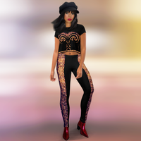 Full front view of female model wearing DESTINY black and gold leggings tight fit rave outfit
