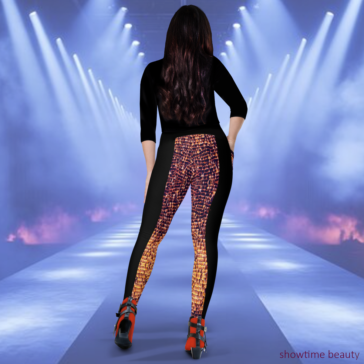 Back view of model wearing DESTINY gold copper crossover leggings with black chaps print and pockets, walking on runway at fashion show