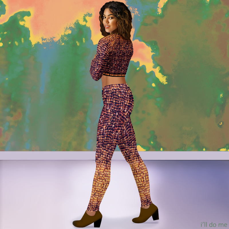 Side profile of DESTINY gold copper leggings on runway model, showing fit and slimming silhouette