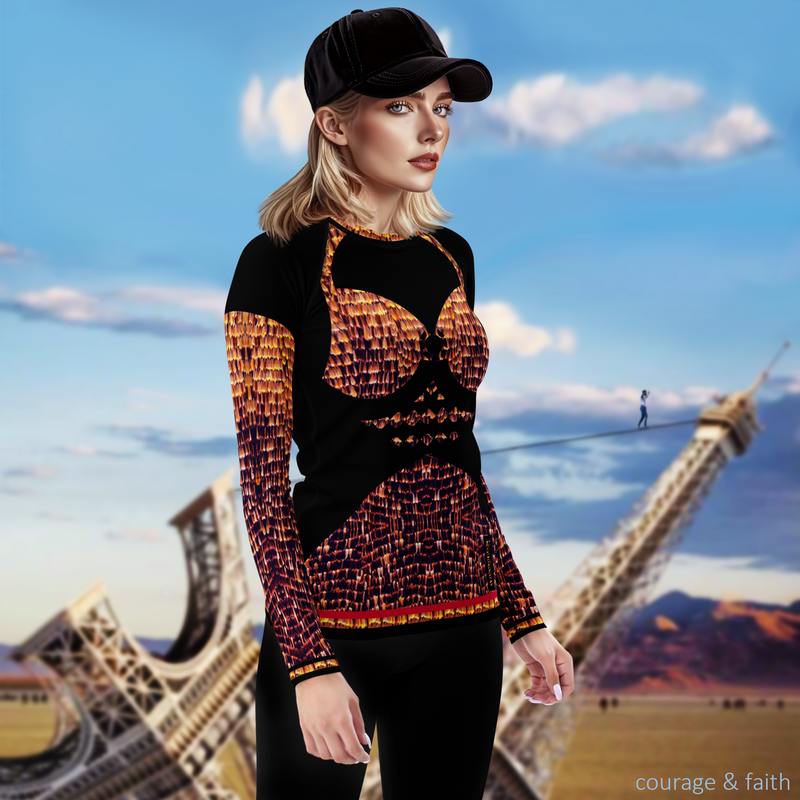 Right view of model wearing black DESTINY long sleeve crew top with bra design in gold copper tones, at a desert festival